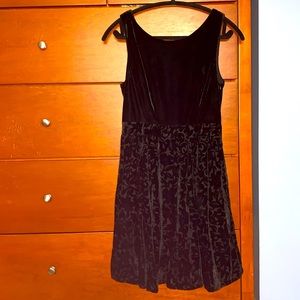 Velvet black dress.